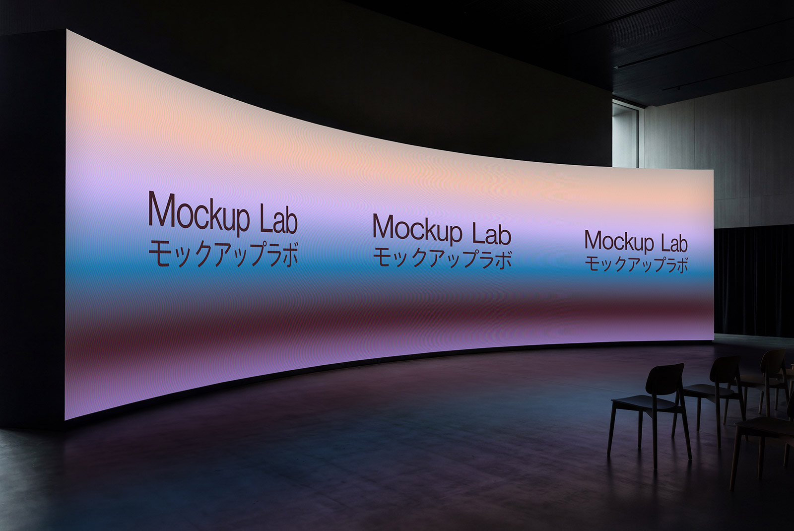 Front view of a large screen mockup displaying a vibrant digital design.